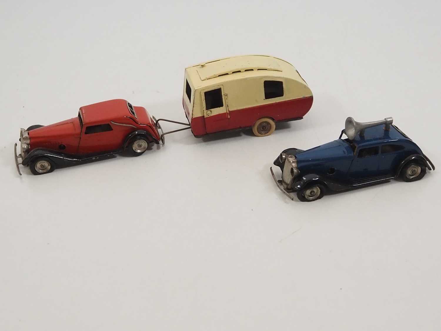 Lot 250 - A group of vintage TRIANG MINIC clockwork cars...