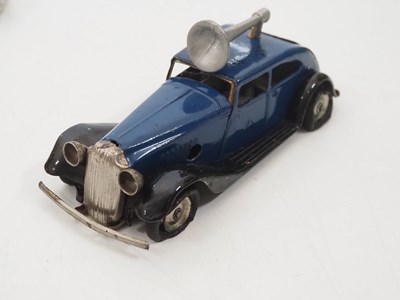 Lot 250 - A group of vintage TRIANG MINIC clockwork cars...