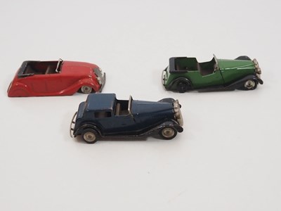 Lot 251 - A group of vintage TRIANG MINIC clockwork cars...