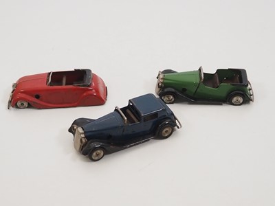 Lot 251 - A group of vintage TRIANG MINIC clockwork cars...