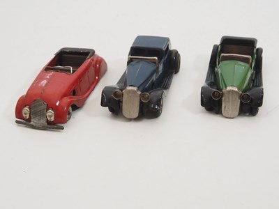 Lot 251 - A group of vintage TRIANG MINIC clockwork cars...