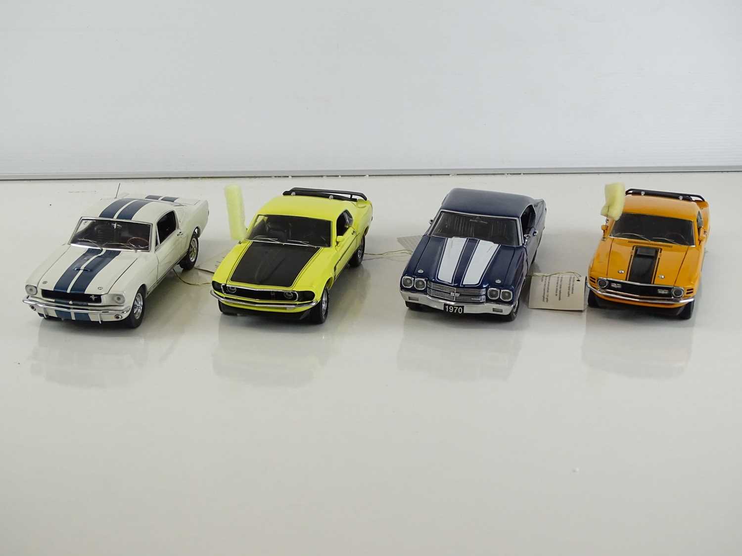 Lot 168 - A group of diecast cars in 1:24 Scale by...