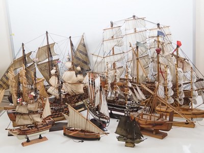 Lot 264 - A fleet of wooden and resin model sailing...