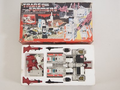 Lot 266 - A vintage original HASBRO Transformers Autobot...