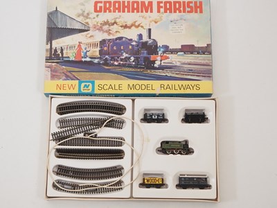 Lot 276 - A pair of vintage N gauge train sets by GRAHAM...