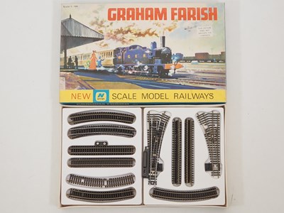 Lot 276 - A pair of vintage N gauge train sets by GRAHAM...