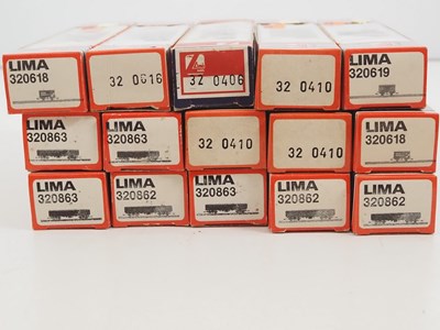 Lot 294 - A group of LIMA N gauge goods wagons and bogie...