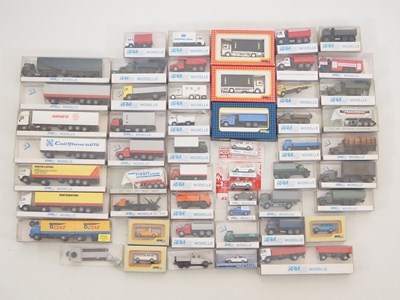 Lot 357 - A group of HO scale plastic model vehicles,...