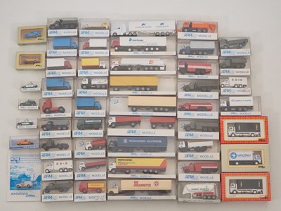 Lot 358 - A group of HO scale plastic model vehicles,...