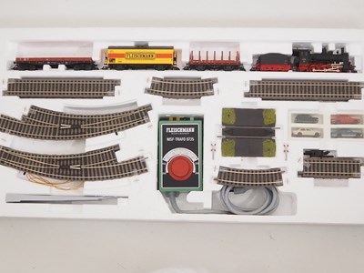 Lot 361 - A FLEISCHMANN HO gauge starter goods train set,...