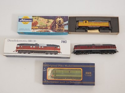Lot 363 - A pair of PIKO HO gauge diesel locomotives in...