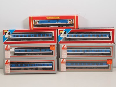 Lot 383 - A group of OO gauge rolling stock comprising a...