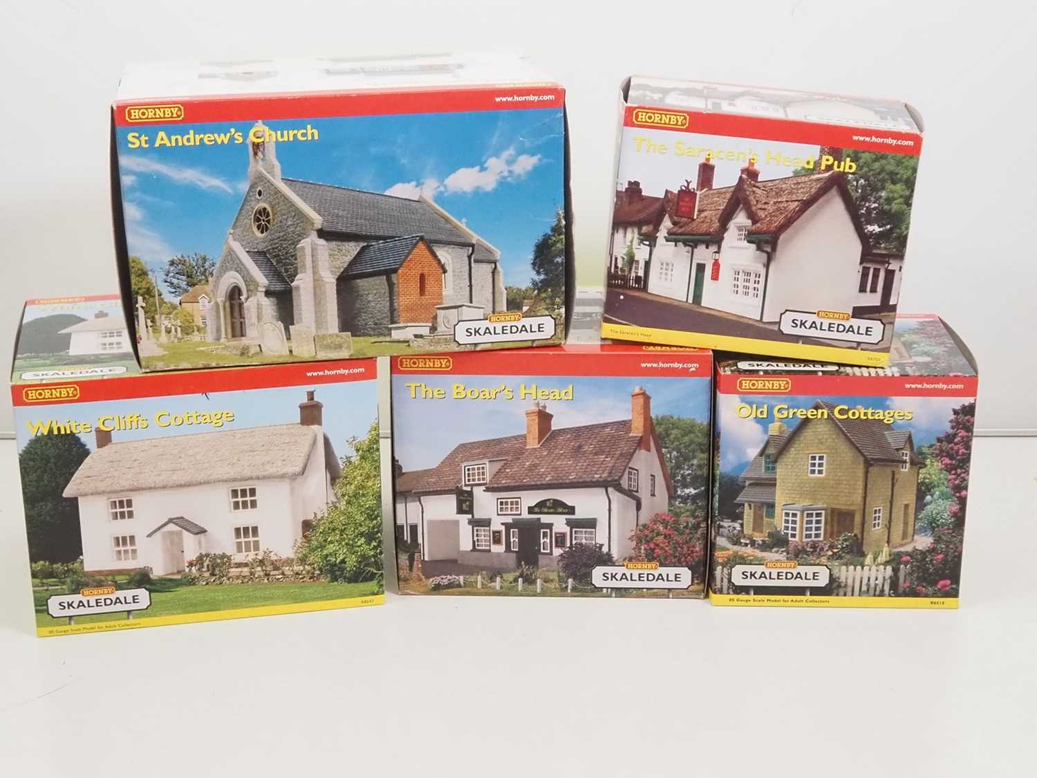 Lot 491 - A village of HORNBY SKALEDALE OO gauge resin...