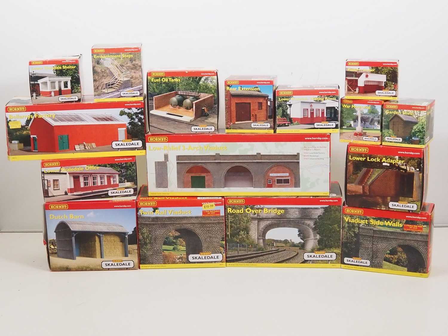 Lot 494 - A city of HORNBY SKALEDALE OO gauge buildings...