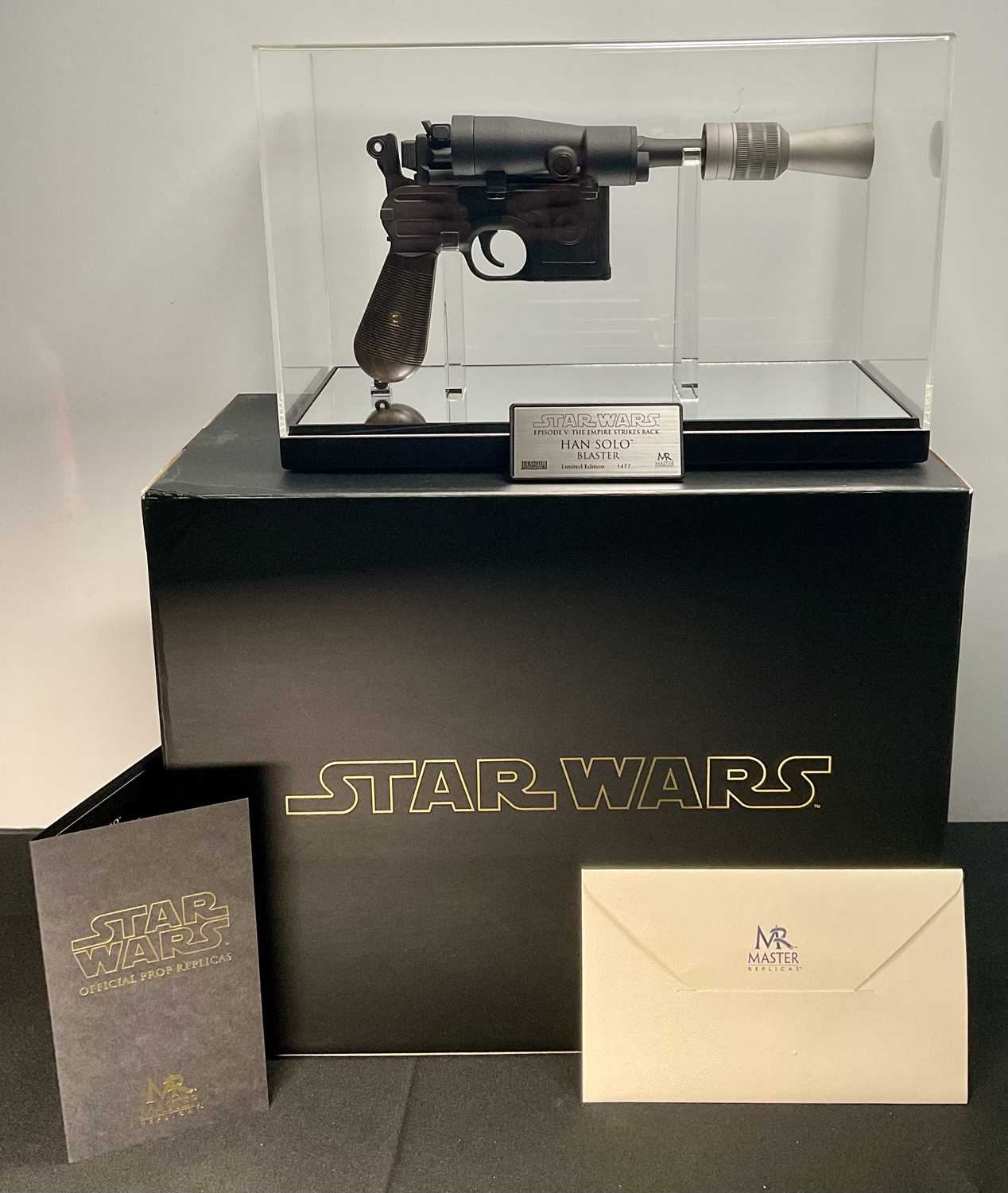 Lot 522 - STAR WARS - A Master Replicas Han Solo Blaster...