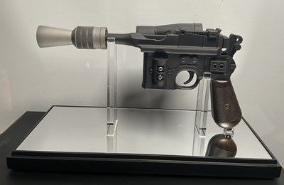 Lot 522 - STAR WARS - A Master Replicas Han Solo Blaster...