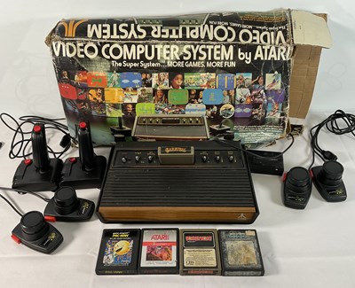 Lot 358 - RETRO GAMING - An Atari CX-2600 video computer...