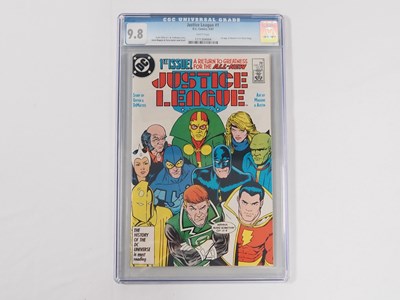Lot 322 - JUSTICE LEAGUE #1 - (1987 - DC) - GRADED 9.8...