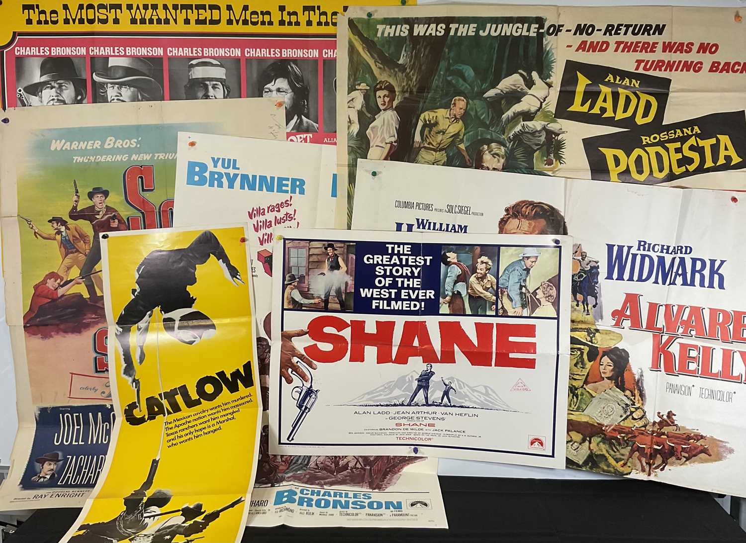 Lot 80 - A group of Westerns movie posters comprising...