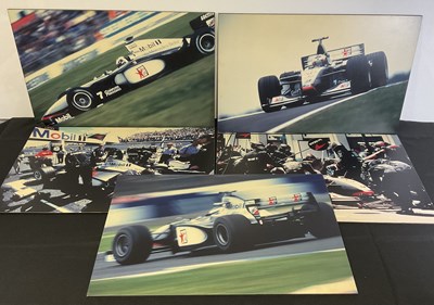 Lot 340 - A group of 5 photographic prints of McLaren F1...