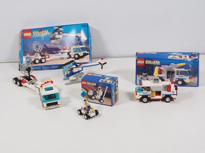 Lot 29 - LEGO - CLASSIC TOWN A group of three Launch...