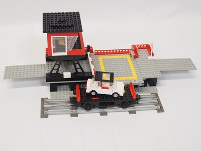 Lot 62 - LEGO - TRAIN #7839 - 12v Car Transport Depot -...