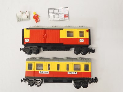 Lot 65 - LEGO - TRAIN #7815 and #7819 4.5v train parts -...