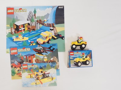 Lot 104 - LEGO - CLASSIC TOWN - A selection of parts and...