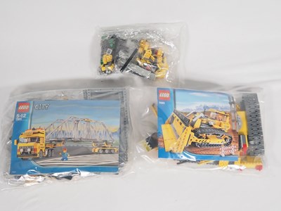 Lot 108 - LEGO - CITY - A group of three sets comprising...