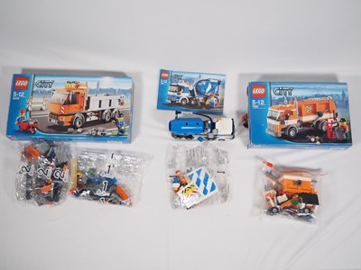 Lot 112 - LEGO - CITY - A group of three sets comprising...