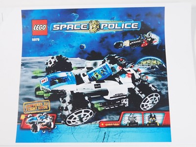 Lot 128 - LEGO - SPACE - A pair of Space Police III sets...