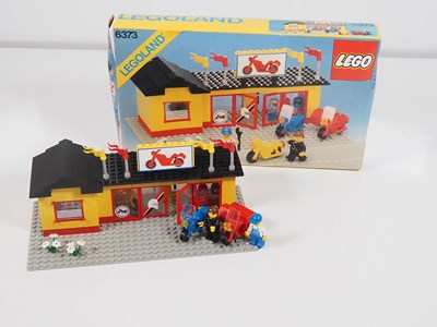 Lot 142 - LEGO -TOWN #6373 Motorcycle Shop - complete...