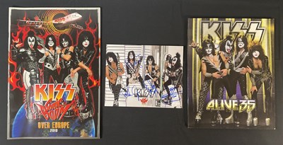 Lot 340 - A KISS 2010 Sonic Boom tour photo card signed...