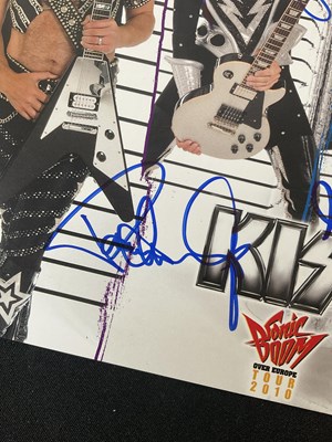Lot 340 - A KISS 2010 Sonic Boom tour photo card signed...