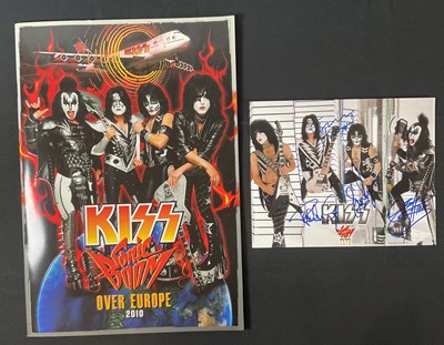 Lot 333 - A KISS 2010 Sonic Boom tour photo card signed...