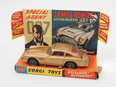 Lot 12 - A CORGI 261 diecast James Bond's Aston Martin...