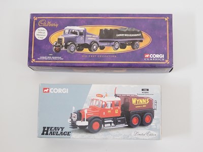 Lot 13 - A group of boxed dicast vehicles comprising a...