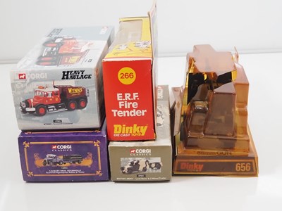 Lot 13 - A group of boxed dicast vehicles comprising a...