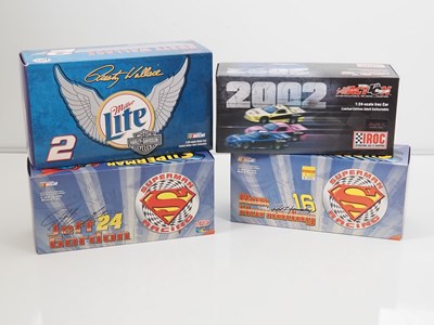 Lot 14 - A group of ACTION RACING COLLECTABLES 1:24...