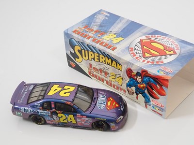 Lot 14 - A group of ACTION RACING COLLECTABLES 1:24...