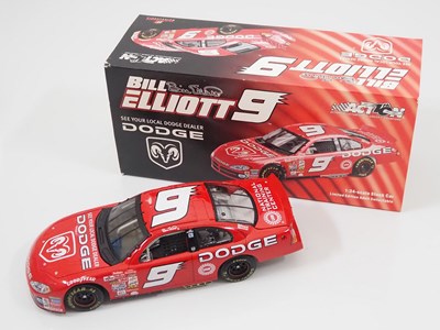 Lot 15 - A group of ACTION RACING COLLECTABLES 1:24...