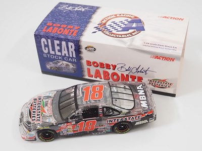 Lot 15 - A group of ACTION RACING COLLECTABLES 1:24...