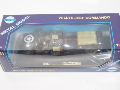 Lot 27 - A group of 1:24 scale diecast military...