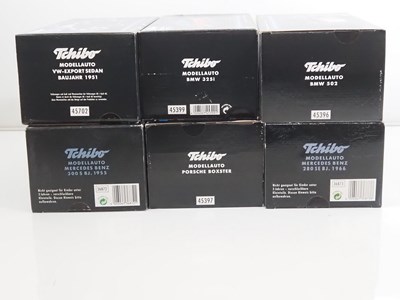 Lot 69 - A group of 1:18 scale diecast cars by TCHIBO,...