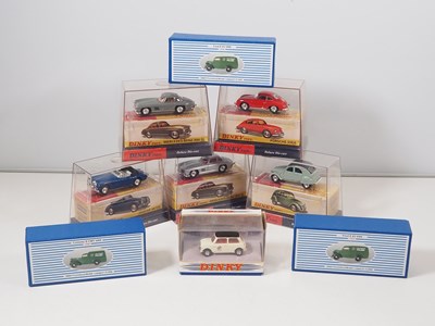 Lot 73 - A group of DINKY diecast Deluxe issues in...