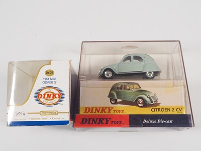 Lot 73 - A group of DINKY diecast Deluxe issues in...