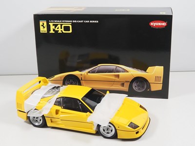 Lot 107 - A KYOSHO 1:12 scale diecast Ferrari F40 car in...