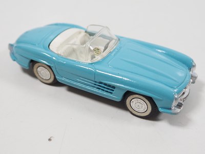 Lot 116 - A pair of CORGI diecast cars comprising a 303...