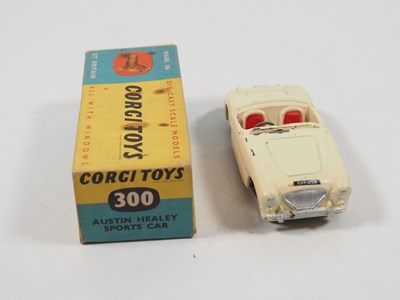 Lot 116 - A pair of CORGI diecast cars comprising a 303...