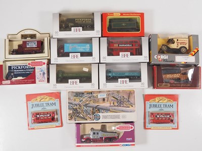 Lot 129 - A mixed group of diecast lorries, buses etc by...